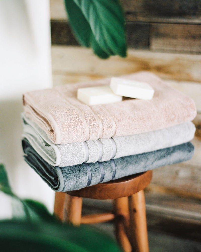 A stack of thick Cariloha towels.